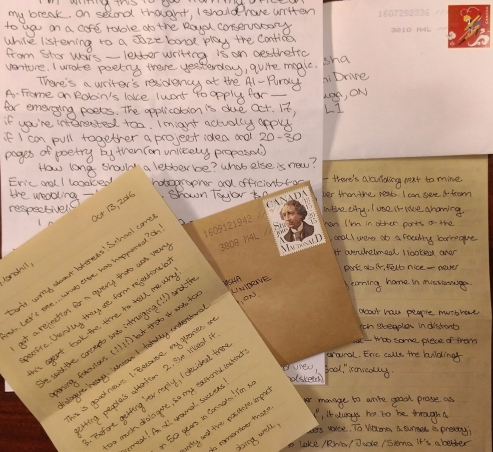 Image of simple handwritten letters and stamped envelopes.